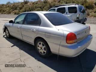 2001 Hyundai Sonata GLS с VIN KMHWF35V81A392523, выставлен на аукционе Copart как лот 74584334 с пробегом 174 597 миль миль и Списание • Salvage title. История ставок и продаж доступна на DreamBid. Изображение 2.