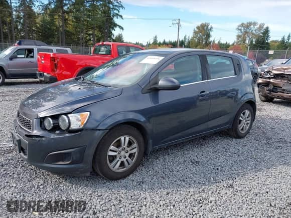 2013 Chevrolet Sonic LT with VIN 1G1JC6SG2D4148084, listed as a IAAI auction lot 43459236 with 94,963 mi miles and . Bid and sale history available at DreamBid. Image 2.