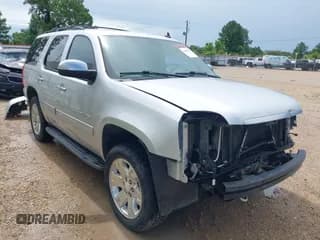 ✅ 2014 GMC Yukon SLT • VIN: 1GKS1CE07ER219108 • Lot: 42495712. Listed on IAAI with 272,584 mi. Free auction sales archive from the USA and detailed vehicle history report at DreamBid. Image 1.