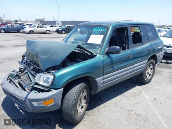 ✅ 1998 Toyota RAV4 • VIN: JT3GP10V7W0034249 • Lot: 42327932. Wystawiony na IAAI z przebiegiem 261 840 mil. Bezpłatny archiwum sprzedaży aukcyjnych z USA i szczegółowy raport historii pojazdu na DreamBid. Zdjęcie 2.