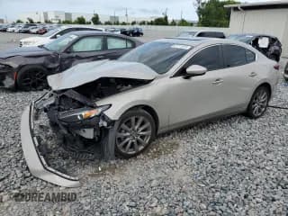 ✅ 2022 Mazda 3 Carbon Edition • VIN: 3MZBPACL9NM314506 • Lot: 61711325. Listed on Copart with 55,940 mi. Free auction sales archive from the USA and detailed vehicle history report at DreamBid. Image 1.