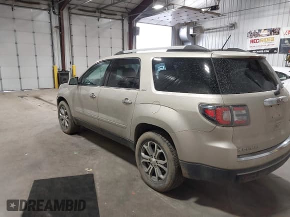 ✅ 2015 GMC Acadia SLT • VIN: 1GKKVSKD1FJ301342 • Lot: 43566026. Listed on IAAI with 103,023 mi. Free auction sales archive from the USA and detailed vehicle history report at DreamBid. Image 3.