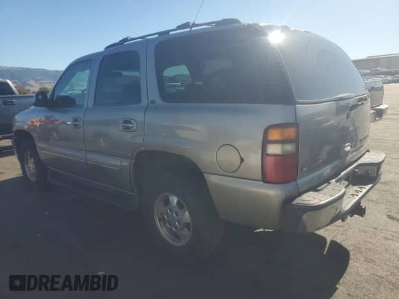2001 Chevrolet Tahoe LT with VIN 1GNEK13TX1J156027, listed as a Copart auction lot 90217385 with Not provided miles and Salvage title. Bid and sale history available at DreamBid. Image 2.