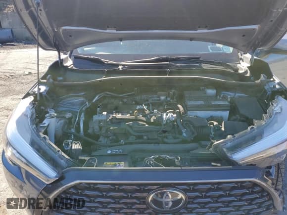 ✅ 2023 Toyota Corolla Cross XLE • VIN: 7MUEAABG3PV066915 • Лот: 86059245. Опубликован ранее на Copart с пробегом 62 017 миль. Бесплатный доступ к архиву аукционных продаж из США и подробный отчёт об истории автомобиля на DreamBid. Изображение 12.