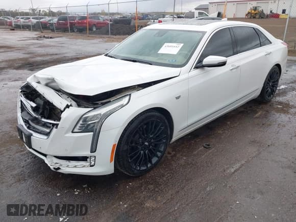 ✅ 2016 Cadillac CT6 Platinum AWD • VIN: 1G6KK5R62GU165223 • Lot: 43601642. Listed on IAAI with 135,869 mi. Free auction sales archive from the USA and detailed vehicle history report at DreamBid. Image 2.