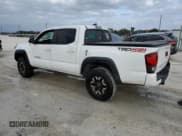 ✅ 2018 Toyota Tacoma TRD Sport • VIN: 3TMCZ5AN3JM174668 • Lot: 87486544. Listed on Copart with 217,834 mi. Free auction sales archive from the USA and detailed vehicle history report at DreamBid. Image 2.