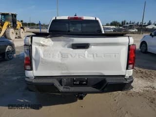 ✅ 2024 Chevrolet Colorado 2WD Work Truck • VIN: 1GCPSBEK0R1167979 • Лот: 75958044. Опубликован ранее на Copart с пробегом 3 135 миль. Бесплатный доступ к архиву аукционных продаж из США и подробный отчёт об истории автомобиля на DreamBid. Изображение 6.