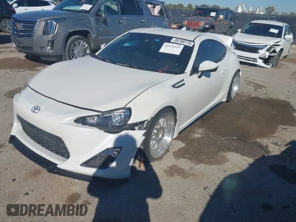✅ 2015 Subaru BRZ Premium • VIN: JF1ZCAB14F9603103 • Lot: 43570355. Listed on IAAI with 113,928 mi. Free auction sales archive from the USA and detailed vehicle history report at DreamBid. Image 2.