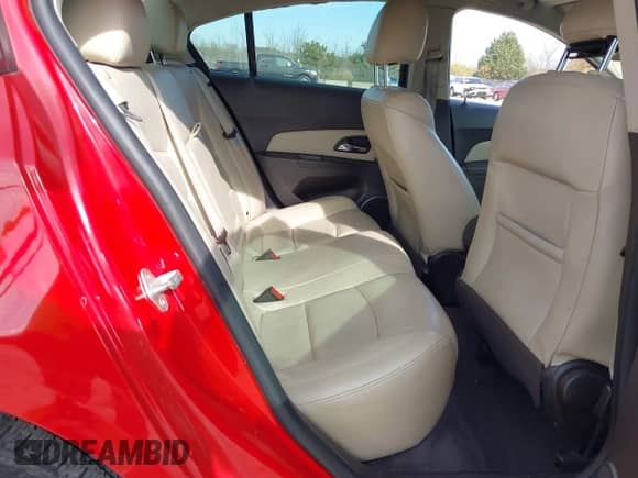 2013 Chevrolet Cruze LTZ z VIN 1G1PG5SB7D7245731, wystawiony jako IAAI lot #43565113 z przebiegiem 125 022 mil mil oraz . Historia ofert i sprzedaży dostępna na DreamBid. Obrazek 8.