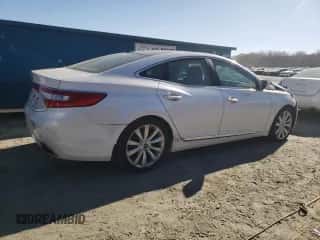 2013 Hyundai Azera с VIN KMHFH4JG2DA212254, выставлен на аукционе Copart как лот 84043814 с пробегом 39 452 миль миль и Списание • Salvage title. История ставок и продаж доступна на DreamBid. Изображение 3.
