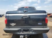 ✅ 2003 Ford F-150 Harley-Davidson • VIN: 1FTRW07373KD66326 • Lot: 59382485. Listed on Copart with 84,079 mi. Free auction sales archive from the USA and detailed vehicle history report at DreamBid. Image 6.