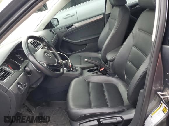 ✅ 2015 Volkswagen Jetta SE • VIN: 3VWD07AJ8FM318503 • Lot: 82072295. Listed on Copart with 77,037 mi. Free auction sales archive from the USA and detailed vehicle history report at DreamBid. Image 7.