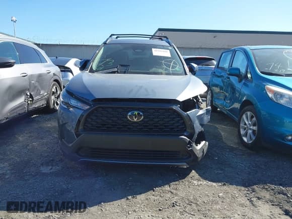 ✅ 2023 Toyota Corolla Cross LE • VIN: 7MUBAABG8PV045934 • Lot: 41593101. Listed on IAAI with 11,378 mi. Free auction sales archive from the USA and detailed vehicle history report at DreamBid. Image 12.