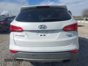 ✅ 2016 Hyundai Santa Fe • VIN: 5XYZTDLB4GG360041 • Лот: 43586922. Опубликован ранее на IAAI с пробегом 96 610 миль. Бесплатный доступ к архиву аукционных продаж из США и подробный отчёт об истории автомобиля на DreamBid. Изображение 6.