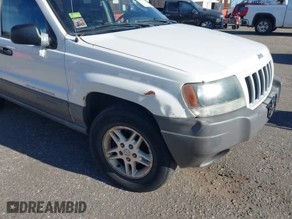 ✅ 2004 Jeep Grand Cherokee Laredo • VIN: 1J8GW48NX4C398321 • Lot: 43895383. Wystawiony na IAAI z przebiegiem 187 067 mil. Bezpłatny archiwum sprzedaży aukcyjnych z USA i szczegółowy raport historii pojazdu na DreamBid. Zdjęcie 6.