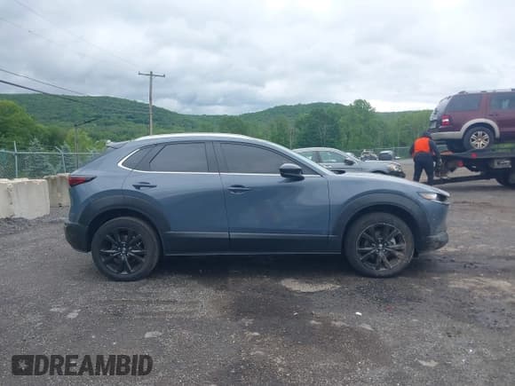 ✅ 2022 Mazda CX-30 S Carbon Edition • VIN: 3MVDMBCL8NM430370 • Lot: 42340348. Listed on IAAI with 79,513 mi. Free auction sales archive from the USA and detailed vehicle history report at DreamBid. Image 13.
