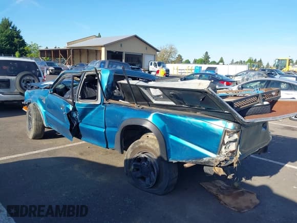 ✅ 1992 Mazda B-Series • VIN: JM2UF6147N0281429 • Lot: 42198800. Listed on IAAI with Not provided. Free auction sales archive from the USA and detailed vehicle history report at DreamBid. Image 3.