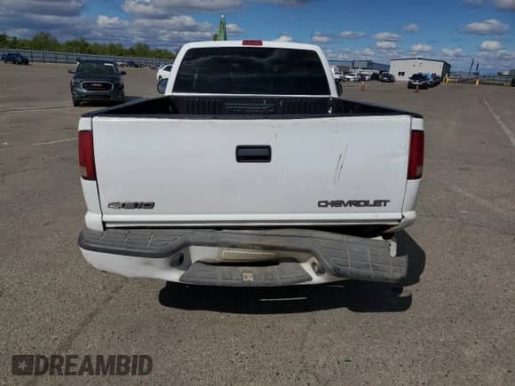 1999 Chevrolet S-10 LS with VIN 1GCCS1444XK140612, listed as a Copart auction lot 82521425 with 248,388 mi miles and Salvage title. Bid and sale history available at DreamBid. Image 6.