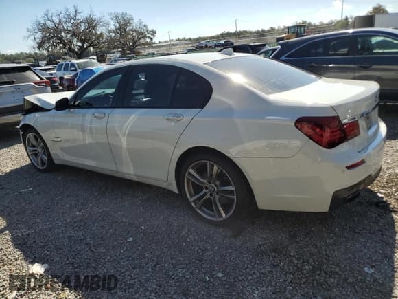 ✅ 2014 BMW 7 Series 740i • VIN: WBAYA6C51ED144180 • Lot: 91565665. Listed on Copart with 94,220 mi. Free auction sales archive from the USA and detailed vehicle history report at DreamBid. Image 2.