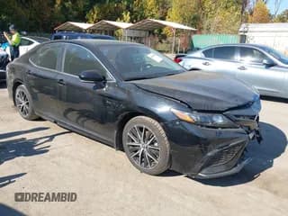 ✅ 2022 Toyota Camry Hybrid SE • VIN: 4T1S31AK2NU594799 • Lot: 43542459. Listed on IAAI with 79,867 mi. Free auction sales archive from the USA and detailed vehicle history report at DreamBid. Image 1.