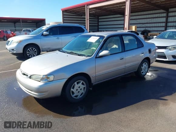 ✅ 2000 Toyota Corolla VE • VIN: 1NXBR12E0YZ361516 • Lot: 41366915. Listed on IAAI with 195,456 mi. Free auction sales archive from the USA and detailed vehicle history report at DreamBid. Image 2.
