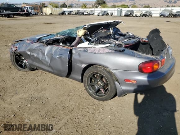 ✅ 1999 Mazda MX-5 Miata • VIN: JM1NB3531X0120369 • Lot: 75839864. Wystawiony na Copart z przebiegiem Nie podano. Bezpłatny archiwum sprzedaży aukcyjnych z USA i szczegółowy raport historii pojazdu na DreamBid. Zdjęcie 2.
