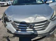 ✅ 2015 Hyundai Santa Fe • VIN: 5XYZT3LB7FG252957 • Lot: 87065335. Listed on Copart with 70,741 mi. Free auction sales archive from the USA and detailed vehicle history report at DreamBid. Image 12.