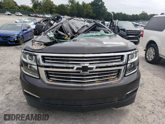 2017 Chevrolet Suburban Premier z VIN 1GNSCJKC7HR123032, wystawiony jako Copart lot #70243104 z przebiegiem Nie podano mil oraz Szkoda całkowita • Salvage title. Historia ofert i sprzedaży dostępna na DreamBid. Obrazek 5.