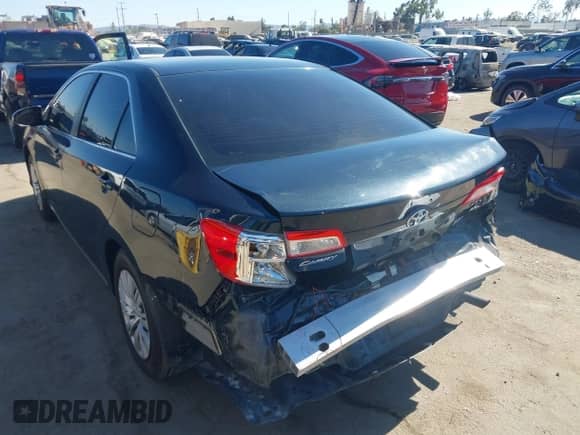 2012 Toyota Camry XLE with VIN 4T1BD1FK8CU016886, listed as a IAAI auction lot 42895318 with 88,979 mi miles and . Bid and sale history available at DreamBid. Image 3.