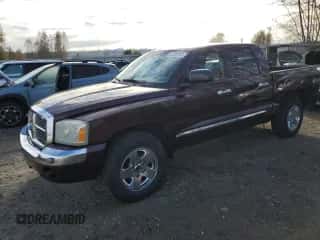 2005 Dodge Dakota Laramie z VIN 1D7HW58NX5S248188, wystawiony jako Copart lot #75443734 z przebiegiem 209 716 mil mil oraz Szkoda całkowita • Salvage title. Historia ofert i sprzedaży dostępna na DreamBid. Obrazek 1.
