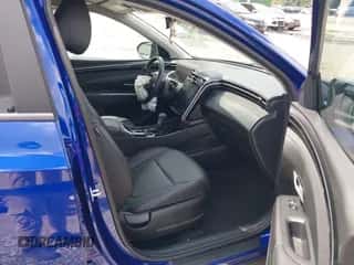 2023 Hyundai Tucson SEL z VIN 5NMJFCAE4PH196713, wystawiony jako IAAI lot #42949944 z przebiegiem 22 921 mil mil oraz . Historia ofert i sprzedaży dostępna na DreamBid. Obrazek 5.