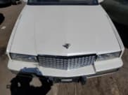 ✅ 1991 Cadillac Eldorado • VIN: 1G6EL13B2MU602660 • Lot: 67365674. Wystawiony na Copart z przebiegiem 108 880 mil. Bezpłatny archiwum sprzedaży aukcyjnych z USA i szczegółowy raport historii pojazdu na DreamBid. Zdjęcie 11.