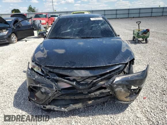 2019 Toyota Camry LE z VIN 4T1B11HK7KU741576, wystawiony jako Copart lot #71667015 z przebiegiem 101 333 mil mil oraz Szkoda całkowita • Salvage title. Historia ofert i sprzedaży dostępna na DreamBid. Obrazek 5.