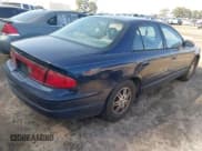 ✅ 2001 Buick Regal LS • VIN: 2G4WB52K611162104 • Lot: 41935549. Listed on IAAI with 171,767 mi. Free auction sales archive from the USA and detailed vehicle history report at DreamBid. Image 4.