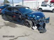 ✅ 2019 Toyota Camry SE • VIN: 4T1B11HK4KU829128 • Lot: 43395507. Listed on IAAI with 84,327 mi. Free auction sales archive from the USA and detailed vehicle history report at DreamBid. Image 1.