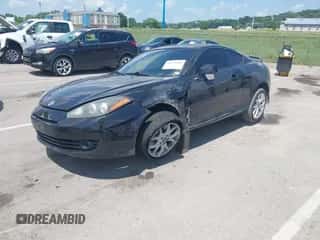 2007 Hyundai Tiburon GT с VIN KMHHN66F17U261929, выставлен на аукционе IAAI как лот 42679006 с пробегом 100 213 миль миль и . История ставок и продаж доступна на DreamBid. Изображение 2.