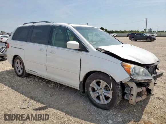 ✅ 2010 Honda Odyssey Touring • VIN: 5FNRL3H95AB074763 • Lot: 71676915. Listed on Copart with 163,663 mi. Free auction sales archive from the USA and detailed vehicle history report at DreamBid. Image 4.