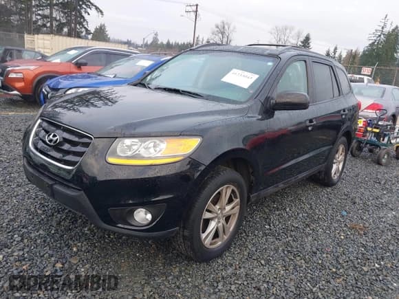 ✅ 2011 Hyundai Santa Fe Limited • VIN: 5XYZHDAG5BG002875 • Lot: 41233043. Listed on IAAI with 64,232 mi. Free auction sales archive from the USA and detailed vehicle history report at DreamBid. Image 2.