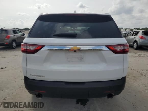 ✅ 2021 Chevrolet Traverse LS • VIN: 1GNERFKW9MJ109547 • Lot: 72908934. Wystawiony na Copart z przebiegiem 94 050 mil. Bezpłatny archiwum sprzedaży aukcyjnych z USA i szczegółowy raport historii pojazdu na DreamBid. Zdjęcie 6.