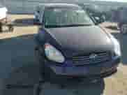 2011 Hyundai Accent GLS z VIN KMHCN4AC0BU610678, wystawiony jako Copart lot #80771464 z przebiegiem 170 776 mil mil oraz Szkoda całkowita • Salvage title. Historia ofert i sprzedaży dostępna na DreamBid. Obrazek 11.