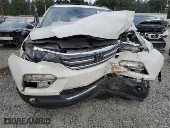 ✅ 2018 Honda Pilot Touring • VIN: 5FNYF6H91JB018033 • Lot: 70367585. Listed on Copart with Not provided. Free auction sales archive from the USA and detailed vehicle history report at DreamBid. Image 5.