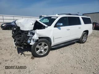 ✅ 2020 Chevrolet Suburban Premier • VIN: 1GNSKJKC7LR183484 • Лот: 80833395. Опубликован ранее на Copart с пробегом 69 705 миль. Бесплатный доступ к архиву аукционных продаж из США и подробный отчёт об истории автомобиля на DreamBid. Изображение 1.