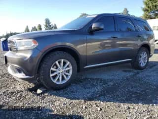 2015 Dodge Durango SXT z VIN 1C4RDJAG7FC745977, wystawiony jako Copart lot #86090625 z przebiegiem 157 492 mil mil oraz Szkoda całkowita • Salvage title. Historia ofert i sprzedaży dostępna na DreamBid. Obrazek 1.