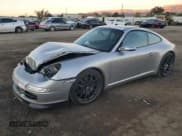 ✅ 2005 Porsche 911 Carrera 997 • VIN: WP0AA29975S716954 • Lot: 79488564. Wystawiony na Copart z przebiegiem 94 989 mil. Bezpłatny archiwum sprzedaży aukcyjnych z USA i szczegółowy raport historii pojazdu na DreamBid. Zdjęcie 1.