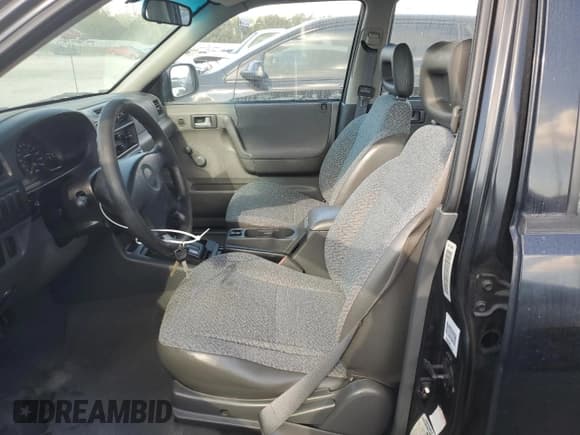 ✅ 1999 Isuzu Rodeo S • VIN: 4S2CK58W7X4357230 • Lot: 85214894. Wystawiony na Copart z przebiegiem 130 370 mil. Bezpłatny archiwum sprzedaży aukcyjnych z USA i szczegółowy raport historii pojazdu na DreamBid. Zdjęcie 7.