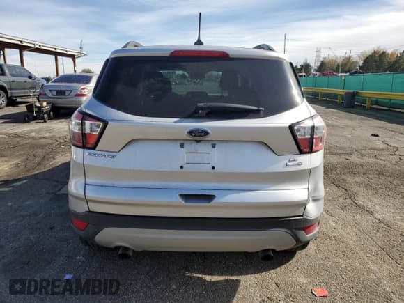 ✅ 2018 Ford Escape SE • VIN: 1FMCU9GD0JUA82249 • Лот: 91039725. Опубликован ранее на Copart с пробегом 114 970 миль. Бесплатный доступ к архиву аукционных продаж из США и подробный отчёт об истории автомобиля на DreamBid. Изображение 6.