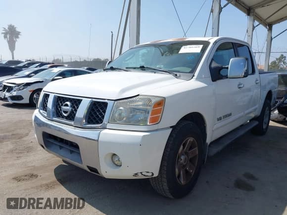 ✅ 2005 Nissan Titan LE • VIN: 1N6AA07BX5N573584 • Lot: 42709369. Listed on IAAI with 221,492 mi. Free auction sales archive from the USA and detailed vehicle history report at DreamBid. Image 2.