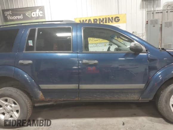 ✅ 2005 Dodge Durango SXT • VIN: 1D4HB38N05F610373 • Лот: 42802258. Опубликован ранее на IAAI с пробегом 148 614 миль. Бесплатный доступ к архиву аукционных продаж из США и подробный отчёт об истории автомобиля на DreamBid. Изображение 14.