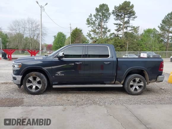 2020 Ram 1500 Laramie с VIN 1C6RREJT1LN105809, выставлен на аукционе IAAI как лот 41891443 с пробегом 102 591 миль миль и . История ставок и продаж доступна на DreamBid. Изображение 14.