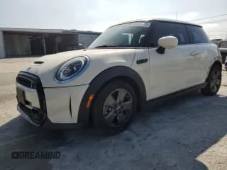 ✅ 2022 MINI Hardtop Cooper S • VIN: WMW53DH08N2P69508 • Lot: 66409995. Wystawiony na Copart z przebiegiem 25 000 mil. Bezpłatny archiwum sprzedaży aukcyjnych z USA i szczegółowy raport historii pojazdu na DreamBid. Zdjęcie 1.
